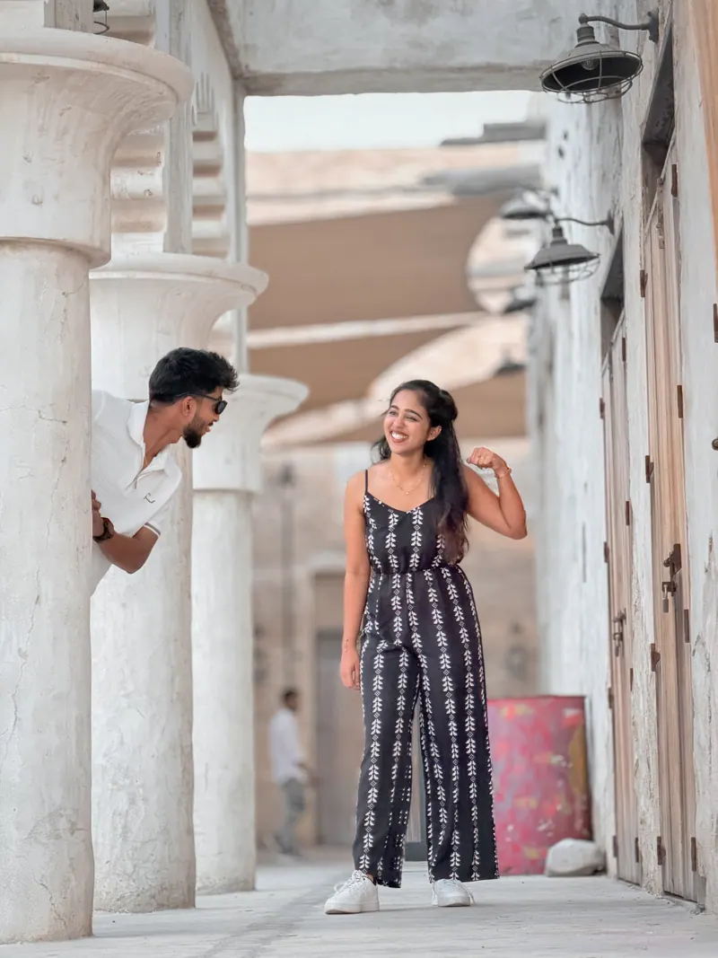 Jishnu peeking out from behind a pillar at Alka